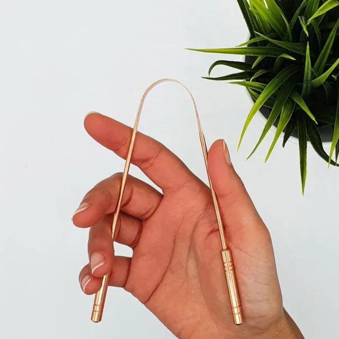 Raspador de lengua en acero inoxidable